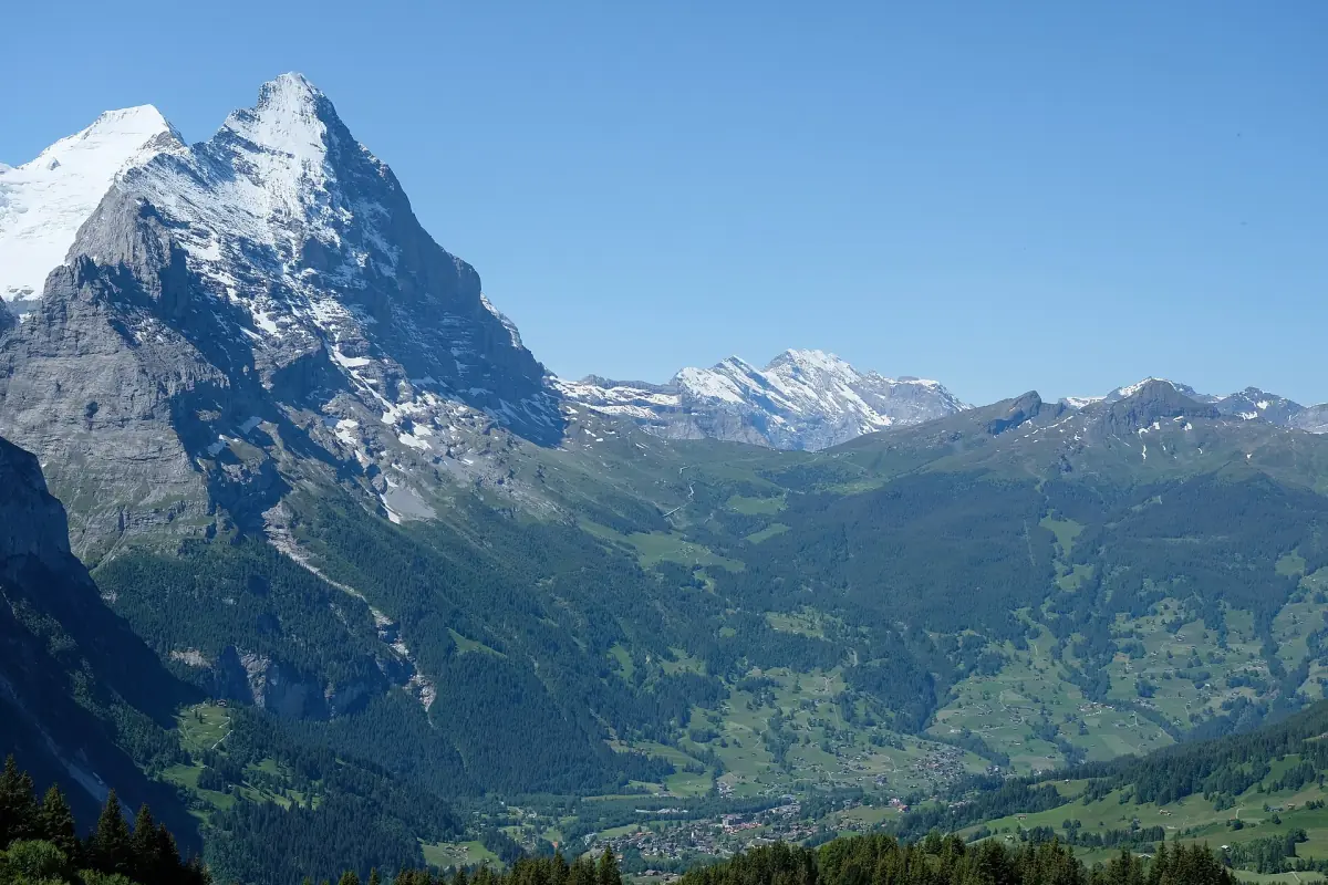 The Eiger and the green Grindelwald valley seen from a hiking trail
